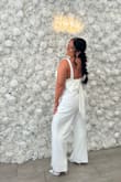 Loved this jumpsuit such good quality!! Just needed to get it hemmed because I'm short. Got lots of compliments on it. - Hailey P.