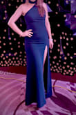 This dress was stretchy and fit comfortably. I got a lot of compliments on the style of the dress. The slit in the front and the open back added sophistication to the outfit. - Amy M.