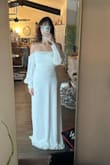 This dress was pretty and nice quality! I wasn't a huge fan of how the sleeves hung on my arms so I'm going to try another style. It's true to size. - Caitlyn M.