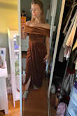 The dress is nice quality and fits the way it should, but since it's velvet, the fabric is very smooth and slippery on the inside. Meaning it kind of slides down off your chest. I have a small chest, I think it would've looked better with a B cup size. C or D cup size would be too large bc that large rectangle of fabric that goes across your chest actually needs to cover your chest. I think my shoulders a bit wide for this style, and I'm too short lol. it's not super flattering lol. Also, the arms are tight like they look nice, but you can't move your arms up bc then the whole outside top of the dress slips above your chest. For me to wear this all day as a bridesmaid, I think it would just be too annoying. Nice quality though - Jenna V.