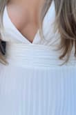 love the dress, but it was very loose up top and more plunging than expected. if I had more time, I would have had alterations to remove an inch from the top/shoulder seams because the plunge was low and the v was also wide. - Stephanie R.
