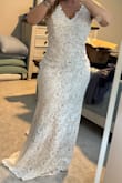 I purchased two dresses, neither of which I had high hopes for, but I'm absolutely smitten with both. The quality of both dresses far surpassed my expectations. The lacework on this particular dress is particularly exquisite. It will require minimal alterations, and honestly, it could probably be made to work as is if I had to. I can't imagine finding a better dress, and the fact that it's so affordable only makes it even more appealing. - Jami B.