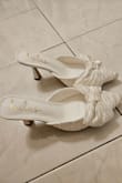Bought these for a cute date for the spring or summer! Very pretty white shoes with ribbons! Can't wait to wear once it gets warmer! - Michelle O.