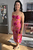 Overall I'm very happy with the dress! Love the fabric and colors!! Size-wise it's too long and too big in the bust, but I tried one size smaller then I couldn't zip it up at all. I will get this hemmed to just below my knee and have to get creative with filling out my bust and tape the top for my wedding. But overall, I'd purchase again and have already received compliments from showing it to a few friends! - Aurora V.