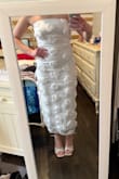 This dress is truly beautiful. I ordered it for a sorority recruitment round and I am so excited to wear it! It is the perfect mix of plain white, but also a little bit of personality and uniqueness! 1000% would recommend, and if you're between sizes, go for the larger one. - Claudia K.