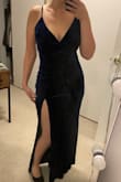 This dress is cute and definitely a great color. However its way too long. I don't consider myself to be that short but I need 4 inch heels just so this doesn't drag on the ground. The slit is also a little high. I would have got a size small but all the reviews and site suggestions made me get a medium. I would say a medium is slightly too loose around the chest and is also probably why it's too long. All that being said, it's good enough to keep. - Shivani S.