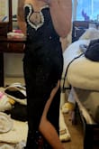 Oh my good god. Absolutely stunning! The rhinestones are a little heavy and I'm not very busty but it seems to stay up fine. I did order an xs even though I'm usually a size small in other dresses. - Kyrstin C.