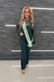 This outfit looked as though it was made for my daughter. She's 5'5, weighs 135. She wore it with 3 1/2 inch heels which she could've gotten away with a shorter heel. Sequin and feathers on top really gave this an elegant, but glam look. - Jennifer W.