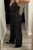 This is stunning in person! So much sparkle. Very comfortable. I am 5'4 and ordered a medium. It was a little long (but hemmed easily.) I am so pleased with this purchase, exceeded my expectations. I only have 4 stars bc of the length being a little long. - Heidi M.