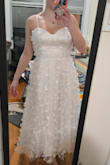 I'm 5'0 and when I saw this dress, I knew it would be the perfect length and fit for my bridal shower! It hits right above the ankle. The butterfly details are gorgeous!! The chest cups could be bigger, but the corset tie-back makes it work. I don't think I'll need to wear a bra with this. Also, the sizing is very forgiving and it is roomier than other Mediums I've gotten from Lulu's. If you're considering this dress, hurry up and buy it! - Megan A.