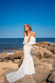 This dress was exactly what I wanted and I'm glad I got it before it went out of stock! I had to get it hemmed because I was barefoot at my beach wedding.  Received so many compliments and it looked way more expensive than it was. - Ana T.