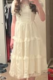 It fits perfect and seems to be good quality. The sleeves are itchy and the neck is wider than I thought, but overall I love it! - Rebecca H.