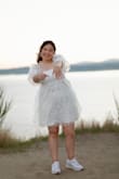 I truly enjoyed how beautiful this dress was. The detailing was phenomenal. Only thing I had to complain about was the tightness of the elasticity against my bicep. Overall, nice on the chest area and waist. - Cynthia R.