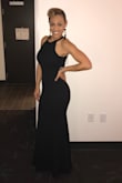 This dresss fit so well! I received so many compliments when I wore it. It had a nice snug feeling and didn't feel tight around the neck. Once I put heels on too it was just right where I wanted it at my feet. I was very pleased with this dress. - Brittney W.