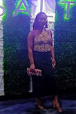 It literally goes with everything! The shoulder strap is removable so it becomes a clutch. Wore it for my birthday. Pulled a last minute outfit together nicely. - Erica P.