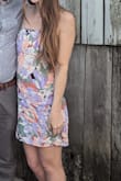 This dress is so adorable. The fit is perfect, the colors of the print are gorgeous, and the fabric is light for hot outdoor occasions. Only critique is the fabric does get a little wrinkly from sitting. - Allie H.