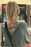 This sweater is cute with the cinched up open back. I love this sweater; it's big but cute. Great to wear out or lounge around the house. - Amanda S.