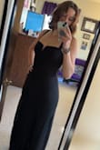 I bought this dress to wear for my anniversary dinner at a semi-formal restaurant. I love the sleek look of the black, neckline, and the lace on the skirt. It is the perfect length for my height and fits true to size. There is a built-in slip, but it seems short to me since it ends right below my hip. - Ari L.