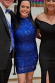 Fits true to size. I got the medium. It has some stretch to it so it was super comfortable. I could sit down comfortably. Beautiful vibrant color is gorgeous in person! (I got the royal blue) - LISA C.