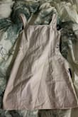 This dress has a flattering shape, and the fabric is a very nice quality. However, it is a weird brownish-yellow color. The color does not look like the photos at all. - Hannah E.