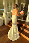 I loved this dress and so did everyone else!! I felt classy, elegant, so simple but so sexy in this dress! We had a beach wedding in Maui and it was perfect. I paired this dress with Lulus shoes and even changed into a Lulus dress for my reception! - Michele H.
