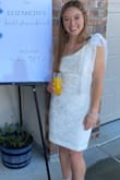 THIS DRESS! One of my all-time favorites. Wore this dress for my bridal shower and it was perfect! It is absolutely adorable, fits true to size, and is comfortable to move around in and sit in despite the stiffer material. The bow does have to be double knotted to stay, but this dress was also such a crowd pleaser! Highly recommend if it is a style you are considering. - Elizabeth H.