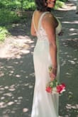 This past July was my big day, and I didn't have a dress yet. After struggling to find anything simple enough in stores, I took a risk and decided to shop online. My wedding was intimate, and I didn't want anything too flashy. This dress turned out to be perfect. It hugged my body in all the right places while comfortably concealing the areas I was insecure about, like my back love handles. It made me feel confident and beautiful, exactly how I wanted to feel on my special day. I'm so grateful I found it in time for the occasion! - Arisleyda H.