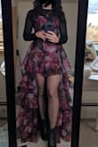 Such a fun dress, I wore it to a winter wedding so it needed to add some warmth, so wore it with a sheer black long sleeve bodysuit and sheer black tights. I got lots of compliments on it and it was very unique. It did come VERY wrinkled and took about 45 min to steam since it has so many layers. I do wish the top most layer wasn't straight across/ as abrupt but I still loved it. - Stephanie H.