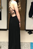 Beautiful dress. A little shorter on me than I expected, but still fits elegantly. You may need a friend to help you put it on though, as the back can be hard to do by yourself. - Julie B.