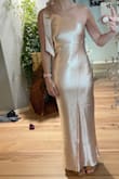 This fit me perfectly and the material looks much more expensive than it was. I love the length of the ribbon for the bow. I'm 5'5 and could potentially wear flats; when wearing heels, the dress hits at about my ankle, which I think is wear it's designed to hit. - Ashley B.