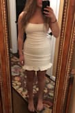 This dress is really fun and cute! I bought it to wear to my dance team's formal (and just ordered it in black as well to see which I like better) and love how it fits! The white is only the SLIGHTEST but see through but just in my tummy. I'm a little bit curvier and have a little muscle to me, but the medium size fits me really well! Love that I can wear this without a bra too! - Dina K.