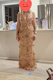 I was so excited to get this dress with how the pic looked but unfortunately, it did not fit my body type as well and it was more nude than rose gold/light pink like the pic showed therefore washed me out. Definitely bummed but otherwise beautiful dress. Also, the sequins do fall off easily so expect a trail of glitter where you walk. And the sides will rub due to the sequins depending on how your arms lay. - Laura F.