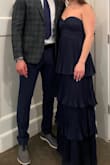 Loved this dress and received so many compliments!! I typically run between a 4 and 6 in most dresses- usually stick with 4's from Lulus. It was tight enough at the bust to not fall down. I will say, I had 3.5" heels on and the dress was still a bit longer. Ultimately no biggie. - Frances K.