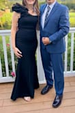 The dress looks very elegant. I'd say it fits a bit smaller than expected. I wear size small all the time but it fits a bit tight. It has a stretchy fabric. It looks exactly like the picture! - Nouran M.