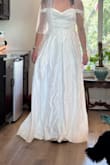 Looking for a budget friendly wedding dress, and this was not the one, the front piece over the chest is loose and sits weird, needs to be sewed and the dress was not the best material - Caitlin K.