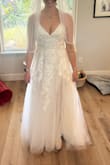 It came down to this one and one other dress. I was obsessed with the beauty. The quality was amazing for the price and fit perfectly. Loved the strappy back. If only they had this dress in a champagne undertone, it would be the one! - Caitlin K.