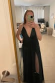Beautiful dress, fits great! I love the flowyness and the adjustable straps! Was a little long so I had it hemmed, but only a few inches which could be fixed by wearing high heels. - Emma F.