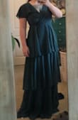Great color and I like the feel of the dress. Good lining. A little tight in the chest, but I'm in between a large and medium so that's a toss up on my part. Very long, but I think that's pretty standard and I plan on having it hemmed. Really happy with my purchase. - Allyson W.