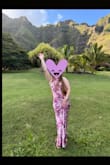 This dress was perfect for a Hawaii wedding. The material of the dress was silky, durable, and looked classy. The cut fit me well and I was able to dance the entire night without any worries! I could have had it hemmed as I am a little short, but with a 2.5" heel I had no complaints. - Jill B.