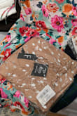 This fits true to size, but the mauve color is much more brown than it looks in the photos. I was expecting it to be more pink/blush. - Lauren F.