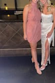 I got this dress for a night before party for my friend's wedding! It is perfect for a cocktail attire event. It runs a bit small so it was snug over the bottom on my but I wouldn't change sizes. - Amanda D.