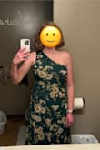 I ordered this dress in both a large and a medium. Unfortunately, the medium was too small in the chest and wouldn't zip closed. The large is too big and doesn't stay up without me squeezing the dress with my arm. Gorgeous dress, I just wish one of the sizes fit me better. I will most likely keep the large and get it altered to fit better. Picture is of the size large dress. - Holly T.