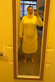 I really wanted this to be great, but it just didn't work for me. I'm 5ft 4in, which is just on the edge of petite sizing, but my bust is a 34I. This pulled over my bust and my belly, and it really just sort of overwhelmed my figure with how much fabric there is. The hem came to my mid-calf and the turtleneck was way too stiff for how high it came. Surprisingly the sleeve length was good though. - Taylor D.