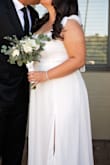 Wore this dress for my special day. It fit so well and the bows add the perfect feminine touch. I'm 5'5 and it was a bit too long even with 3" heels so keep that in mind. I probably could've hemmed it but I liked it a bit longer. - Lexie H.