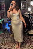 Loved the sparkle on this dress, so I was sad the fit didn't work out. The top cut is not flattering and really accentuated my midsection. It looked almost like a maternity dress to me...and there was no bun in that oven. I felt opacity was ok. Definitely wear seamless Spanx and nude undergarments. It's not see through, but it's not opaque. Also, the zip in the back is unreliable. Kept sliding down, and there was no hook-eye enclosure to keep the top together. - Kiersten S.