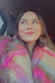 I did not expect to love this coat so much. It is gorgeous. It's extremely warm and vibrant colors. And the fur feels so soft. I'm obsessed. - Brianna K.