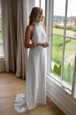 The dress was perfect! Great for a classic simple wedding! 10 out of 10... 5.9 inches, 140 lbs, wearing M probably could have gone with small but still loved it! - Sonja D.