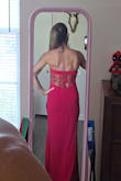 I would love to have given this a 6/5, to be honest! It's the most gorgeous cut and the red is the perfect shade. The back is the main event and the whole reason I bought this! I'm normally between a small and medium in lulus bc of my bust and lats. As I hand implants and a muscular back. I went with a med. Just was able to zil at the top. 
Cons, three corset boning is not advertised. It was too long and was popping through the material upon arrival. It also has a very pointy top that you can't see on the model. So it pokes in and gives armpit/boob fat. An area where I'm quite toned. It was actually painful. I had to get it tailored. She agreed that the boning was too long for the dress. Luckily she was able to fix in expeditiously for my gala event. - Lisa G.