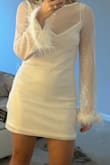 This dress is great if you are a petite frame. It lays nicely and is very flattering overall for the price. Its perfect for going out and not worrying about ruining it or having to wear it again, because let's be real, you're never going to wear "bride white sequin" looks after you get married. - Jennette D.