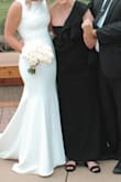 My mom bought this dress for my wedding and got complimented all night! It was so classic but the ruffle sleeve gave it a little extra spark. She was in a wheelchair for the whole day/night and said it was very comfortable to sit in. Had to have the top altered because it was too big but needed the L for her hips - Kate M.